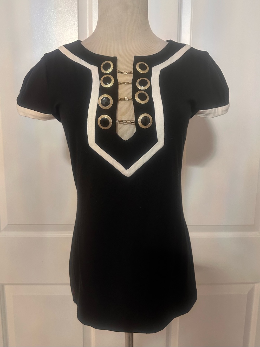 BEBE | Black Short-Sleeve Top with White Trim & Gold Detail